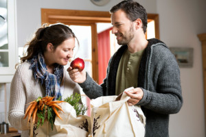 Couple unpacking groceries